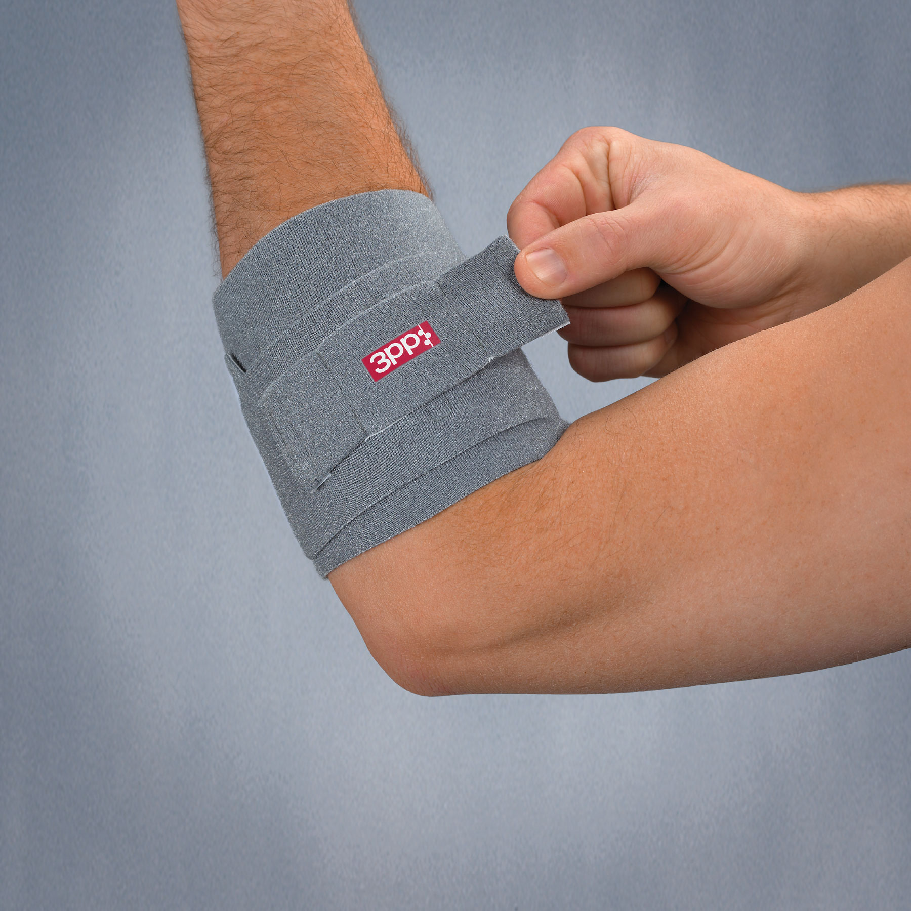 3pp Elbow Wrap tennis elbow splint from 3-Point Products with compression only where needed. Also use for golfer’s elbow.
